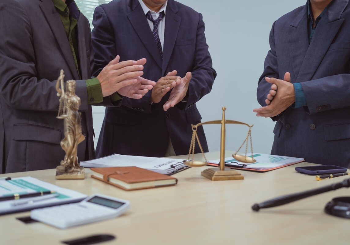 Three lawyers in meeting at the table office, discussing business,civil commercial law,labor law